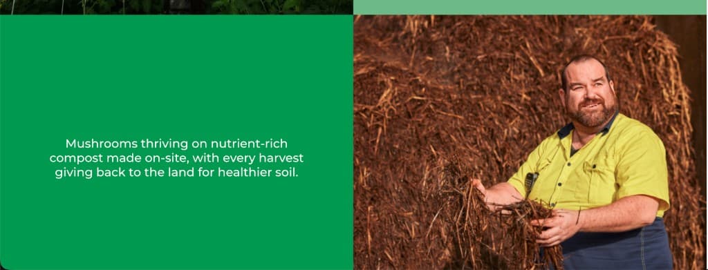Team member holding nutrient-rich compost material